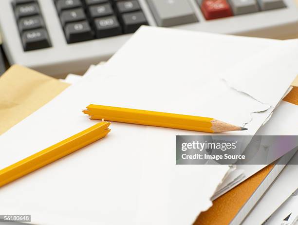 calculator paper and broken pencil - broken calculator stock pictures, royalty-free photos & images