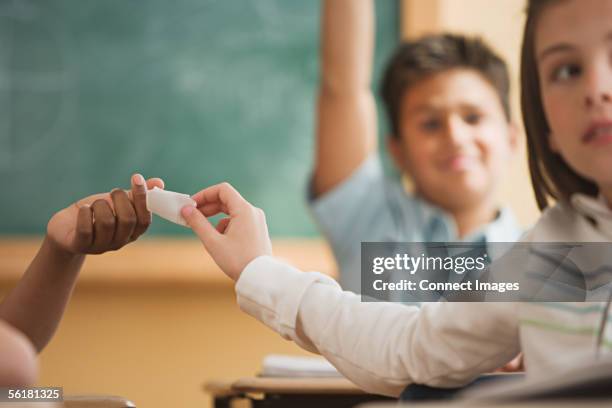 Passing Through Notes 91 Kids Passing Note In Class Stock Photos, High-Res Pictures, and ...