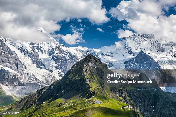 männlichen and the swiss alps - eiger mönch jungfrau stock pictures, royalty-free photos & images