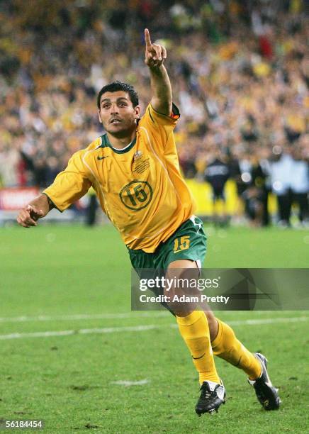 John Aloisi of Australia celebrates scoring the winning penalty in the penalty shoot-out during the second leg of the 2006 FIFA World Cup qualifying...