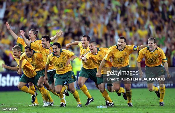 The Australian Socceroos jubilate after defeating Uruguay in the FIFA World Cup qualifier at Stadium Australia in Sydney, 16 November 2005. Australia...