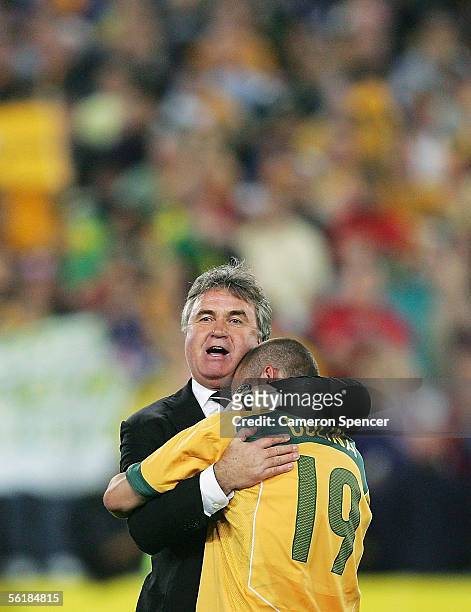 Socceroos coach Guus Hiddink celebrates Australia's victory after the second leg of the 2006 FIFA World Cup qualifying match between Australia and...