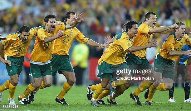 The Socceroos celebrate victory after the penalty shoot-out during the second leg of the 2006 FIFA World Cup qualifying match between Australia and...