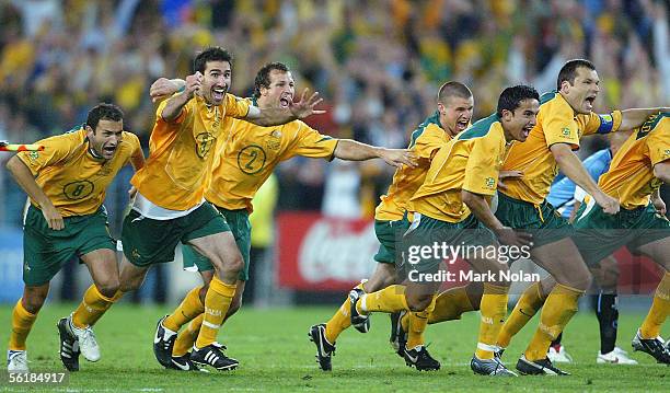 The Socceroos celebrate victory after the penalty shoot-out during the second leg of the 2006 FIFA World Cup qualifying match between Australia and...