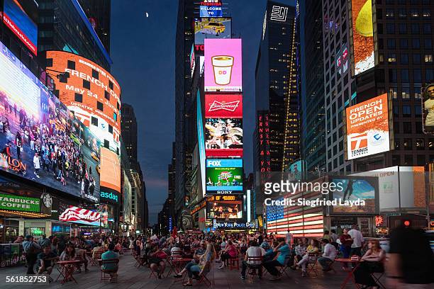 times square at dusk - times square manhattan stock pictures, royalty-free photos & images