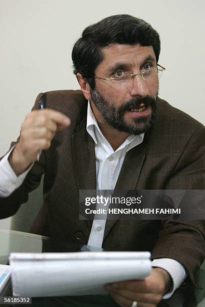 Iranian lawyer Ghasem Sharbani speaks to journalists during a press conference in Tehran 16 November 2005. Iran's hardline judiciary has upheld its...