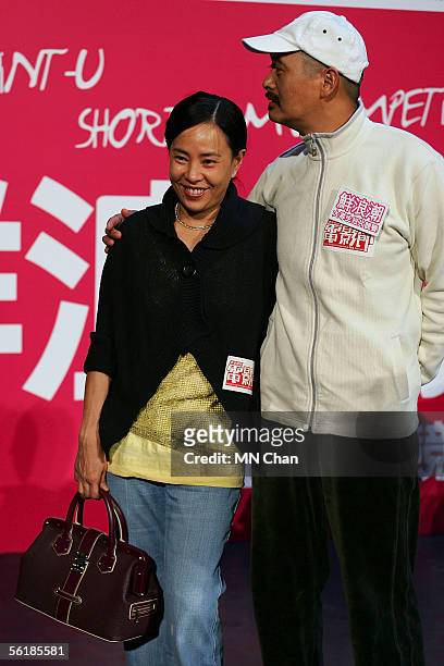 Hong Kong movie star Chow Yun Fat and his wife Jasmine attend a press conference to promote a short film competition for local university students on...
