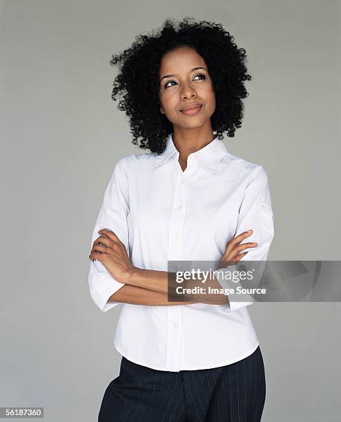 empleada de oficina daydreaming - gray shirt fotografías e imágenes de stock