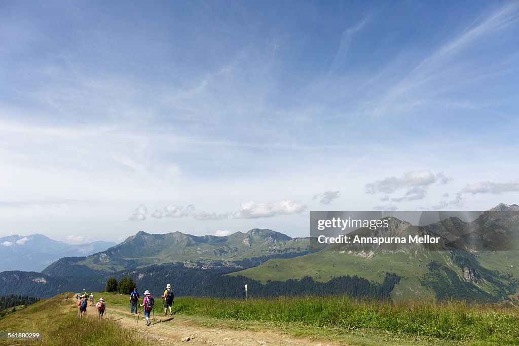 Hikers in the French Alps, near Les Gets, France