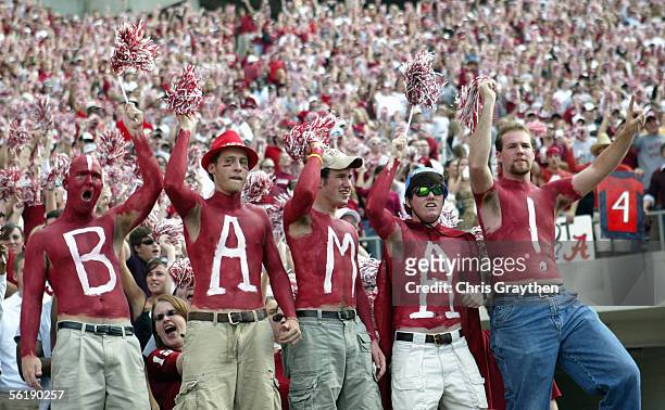 Fans of the University of Alabama Crimson Tide display their body paint during the game with the Louisiana State University Tigers on November 12,...