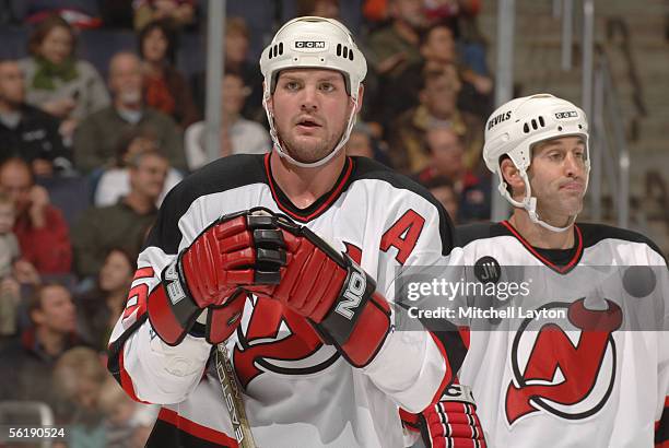 Defenseman Colin White of the New Jersey Devils looks on during the NHL game against the Washington Capitals on November 11, 2005 at MCI Center in...