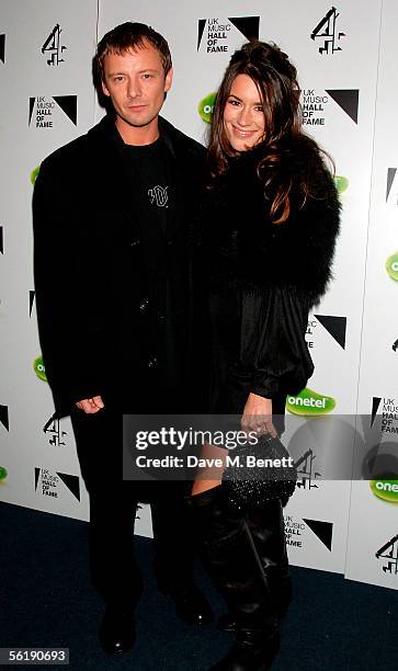 Actors John Simm and Kate Magowan arrive at the live final of the UK Music Hall Of Fame 2005, the culmination of the two-week Channel 4 series...