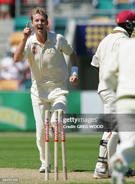 Australian fast bowler Brett Lee is jubilant after bowling West Indies batsman Devon Smith for four runs during the second cricket Test in Hobart, 17...