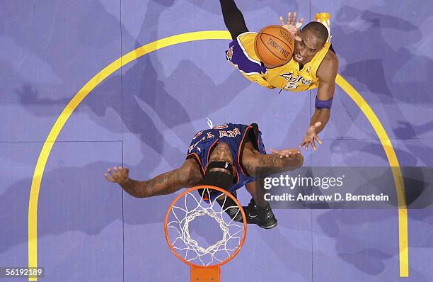 Kobe Bryant of the Los Angeles Lakers puts up a shot against Eddy Curry of the New York Knicks on November 16, 2005 at Staples Center in Los Angeles,...