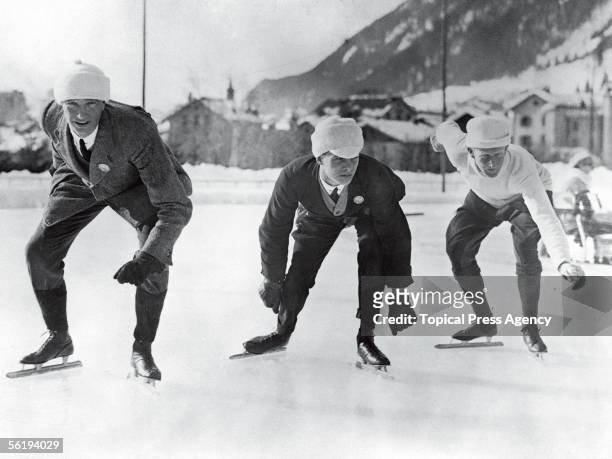 English speed skaters training in Chamonix for the Winter Olympic Games, 16th January 1924. From left to right, B. H. Sutton, L. H. Cambridgeshire...