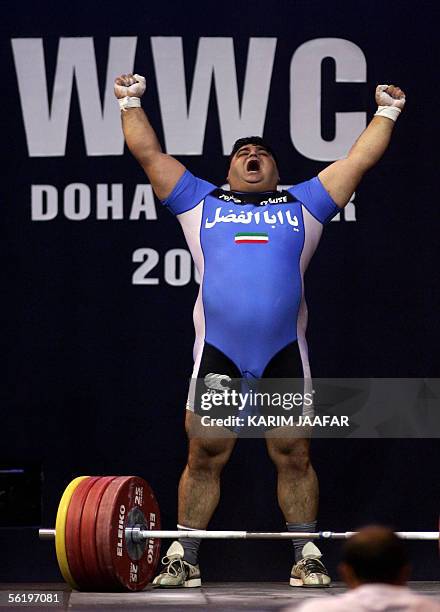 Iran's Hossein Rezazadeh competes in the +105kg category on the final day of the Centennial World Weightlifting Championships 17 November 2005 in...