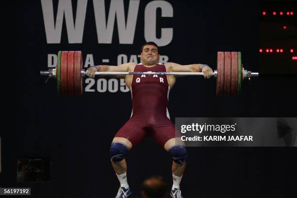 Qatari Jaber Salem Saeed competes in the +105kg category on the final day of the Centennial World Weightlifting Championships 17 November 2005 in...