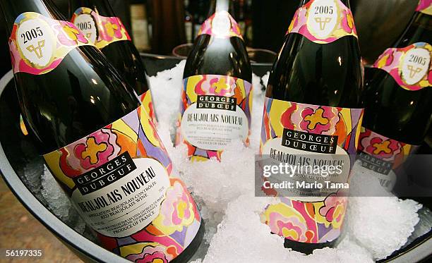 Bottles of Beaujolais Nouveau 2005 sit on ice at Sherry-Lehmann wine and spirits November 17, 2005 in New York City. Beaujolais Nouveau is made in...
