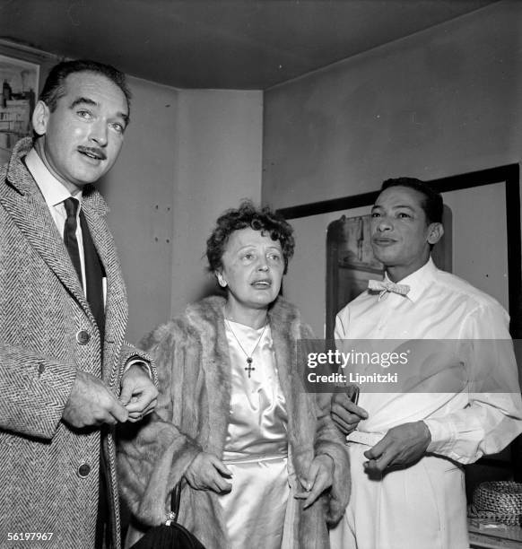 Eddie Barclay, Edith Piaf and Henri Salvador. Paris, theatre of the Alhambra, november 1958.