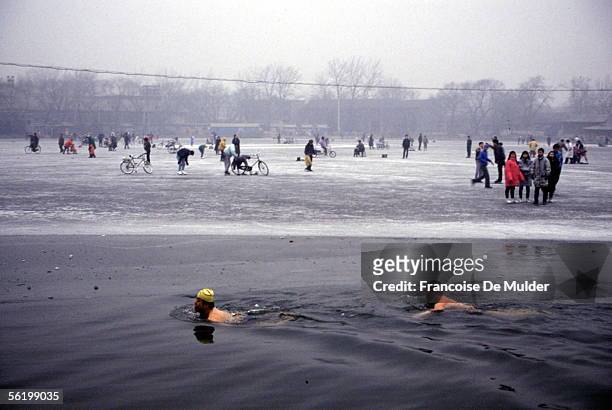 Peking . Iceskating and swimming in winter. Lake of Beihai park. December 1991.