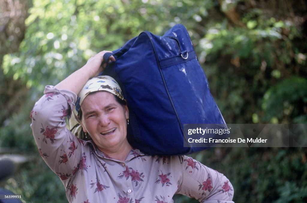 War of Bosnia-Herzegovina. Bosnian woman avoiding