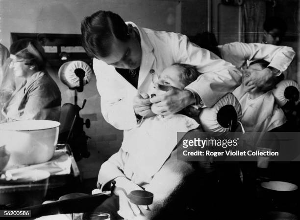Dentist. London, Royal Dental Hospital, about 1930.