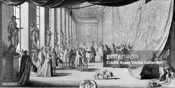 Jean-Baptiste Colbert visiting the Gobelins manufacture and looking at tapestries of the Alexandre le Grand's life according to sketch of Charles Le...