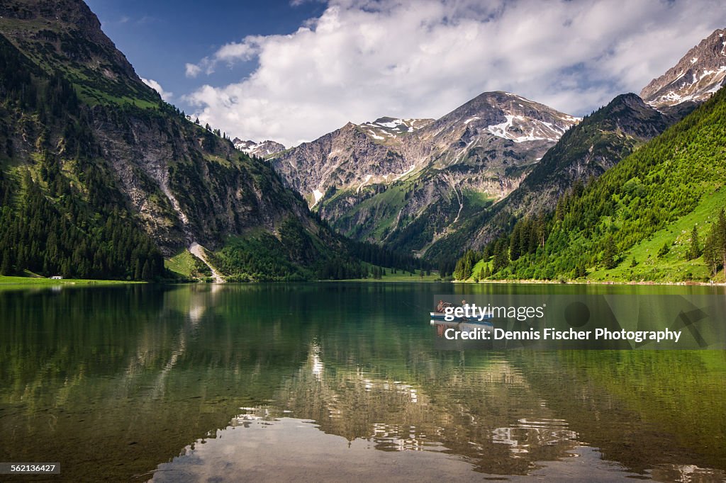 Rowing boat on mountain lake