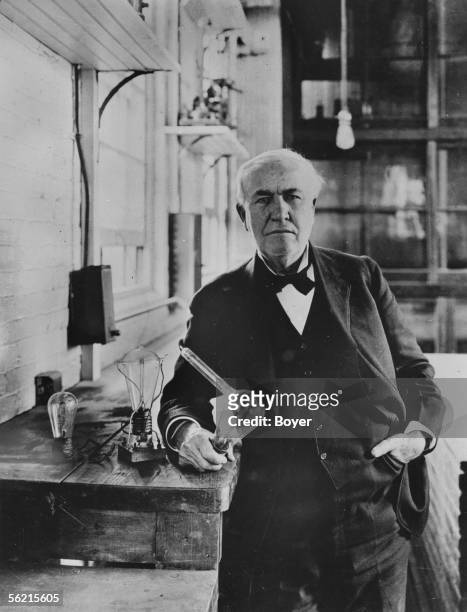 Thomas Edison , American inventor, in 1883 , with the incandescent lamps that he invented.