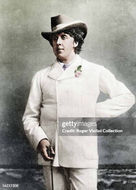 Oscar Wilde , Irish writer, in holidays, about 1893. Guillot de Saix collection. Colourized photo.