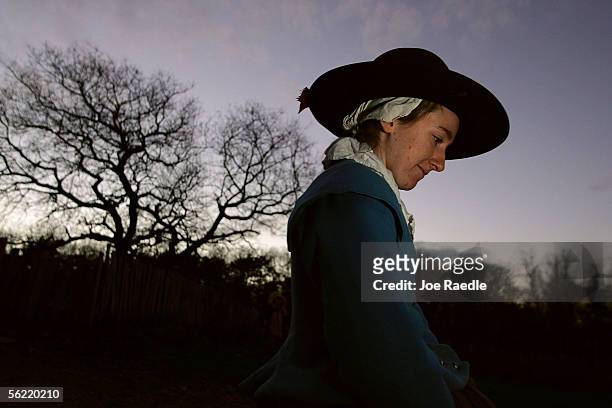 Constant Snow walks through the 1627 Pilgrim Village at "Plimoth Plantation" where she and other role-players portray Pilgrims seven years after the...
