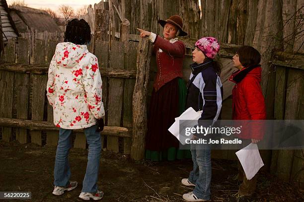 Lydia Hicks gives directions to visitors to the 1627 Pilgrim Village at "Plimoth Plantation" where she and other role-players portray Pilgrims seven...