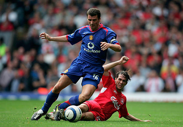 Luis Garcia of Liverpool tackels Roy Keane of Manchester United during the Barclays Premiership match between Liverpool and Manchester United at...