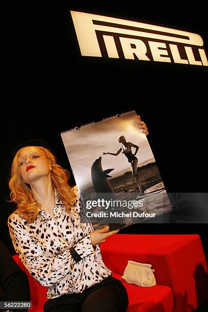 Top model Guinevere Van Seenus attends the photocall to launch this year's famous fashion calendar, the 2006 Pirelli Calendar, at the Palais...