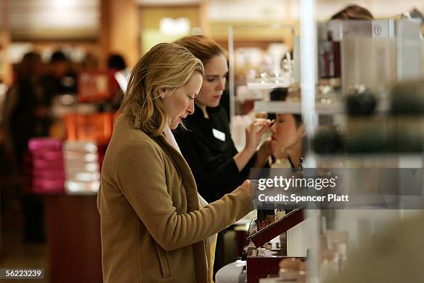 People shop at Macy?s department store November 18, 2005 in New York City. U.S. Commerce Secretary Carlos M. Gutierrez toured the store Friday...
