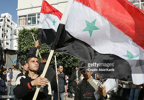 Palestinian youths hold Syrian flags during a pro-Syrian demonstration on November 18, 2005 in Gaza City, Gaza Strip. Hundreds of Palestinians...