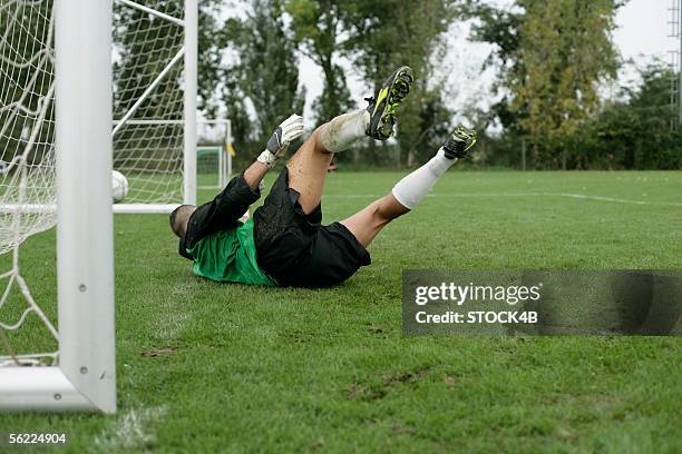 Goalkeeper Rushing Out 8 015 Goalie Down And Out Stock Photos, High-Res Pictures, and Images ...