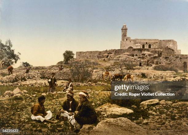 Group of men and boys with their horses at the village of Nabi Samwil in Ottoman Palestine , circa 1895. In the background is the Nabi Samwil tomb, a...