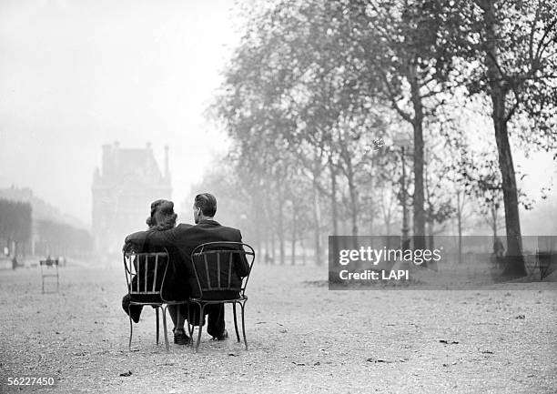 Couple in the garden of Tuileries. Paris, on 1945.