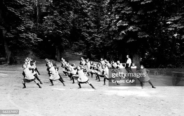 Venissieux . Pupils of a private school doing gymnastics.