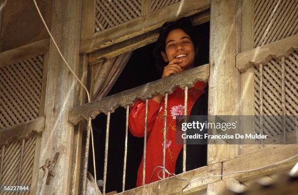 Young girl in the window. Bassora , in May, 1991.