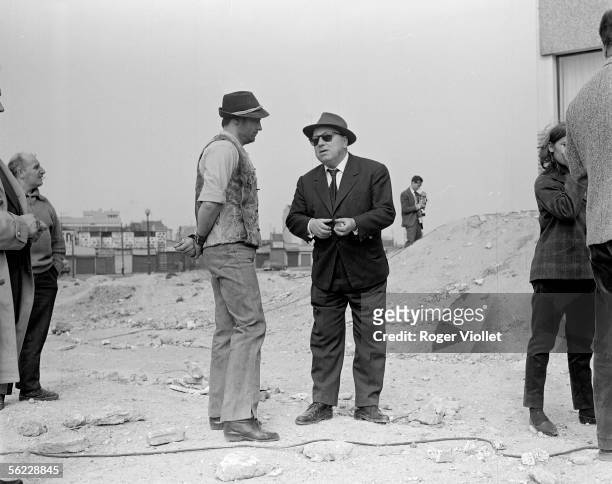 The French director Marcel Carne with Roland Lesaffre, during the shooting of film "Terrain vague". France, 1960.