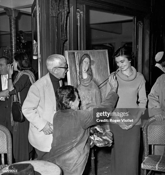 Foujita, French painter, Gerard Philipe and Anouk Aimee, French actors. Cocktail party for the movie "Montparnasse 19" by Jacques Becker. September...