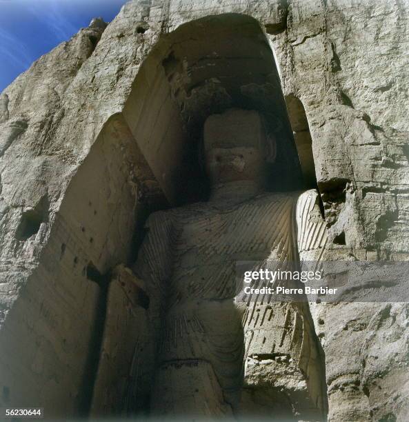 Site of Bamiyan. Monumental statue of Buddha cut in the cliff . Afghanistan, 1970. PB-1028-3.