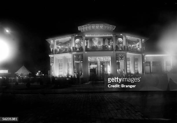 Exhibition of modern, decorative and industrial Arts, Paris, 1925. The pavilion of Studium-Louvre, in the night.