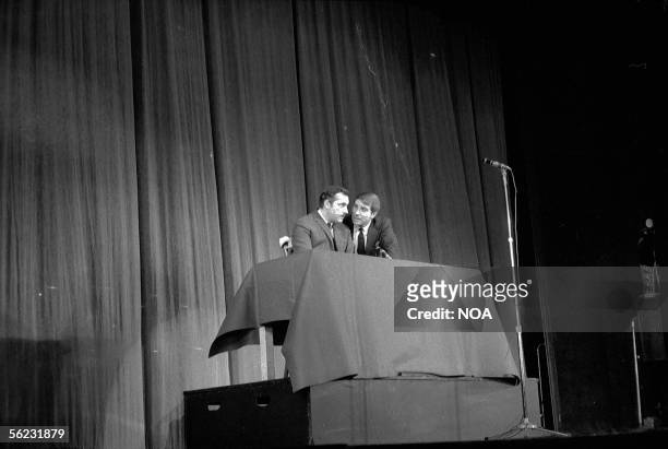 Michel Serrault and Jean Poiret on the stage of the Olympia. Paris. HA-1053-7.