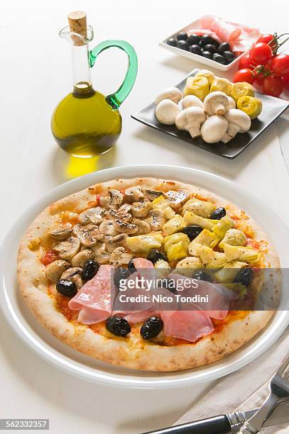 quattro stagioni pizza - stagioni stock pictures, royalty-free photos & images