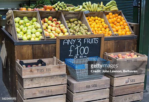 fruit and vegetable stall, borough market - borough market london stock pictures, royalty-free photos & images