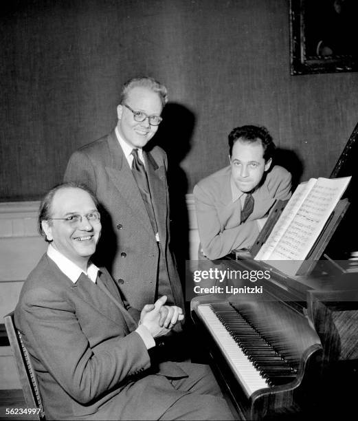 Pierre Boulez, Michel Fano and Olivier Messiaen , French composers, from right to left, in March, 1954.