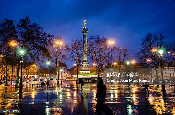 place de la bastille at night - bastille paris stock pictures, royalty-free photos & images